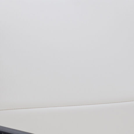 Echo Medium Back Leather Cantilever Visitor Chair with Arms in white leather upholstery and chrome cantilever frame.