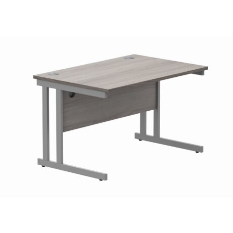 Rectangular office desk with Alaskan Grey Oak top and silver steel double upright cantilever frame, dimensions 1200 x 800 mm.
