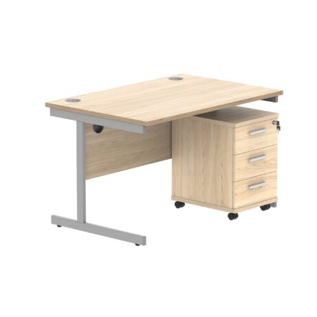 Single upright rectangular desk with Canadian Oak top, silver frame, and three-drawer mobile pedestal. Dimensions: 1200x800 mm.