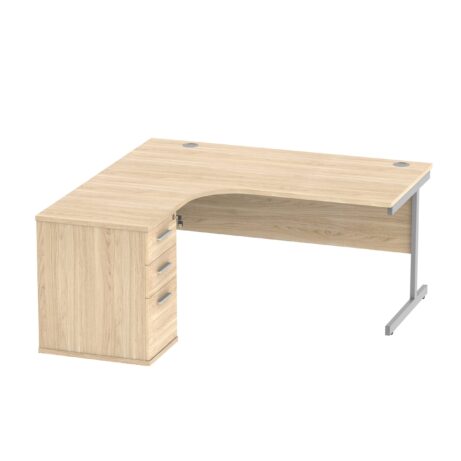 Left hand radial desk with desk high pedestal, Canadian Oak finish, silver frame, dimensions 1600 x 1200mm, 600mm deep.