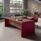 E10 Executive Desk & Return in veneered wood with leather inlays, featuring integrated cable management and a carved modesty panel.