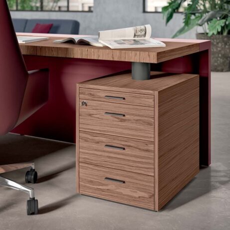 E10 Executive Desk & Return with veneered top, leather inlays, and integrated cable management in a modern office setting.
