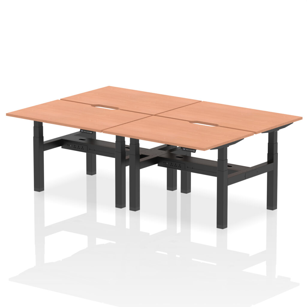 Height adjustable back-to-back scalloped edge bench desk for four, beech top with a black frame.