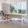 Hive Screens in straight configuration provide flexible privacy in an office setting with a sleek MFC base and metal top rail.