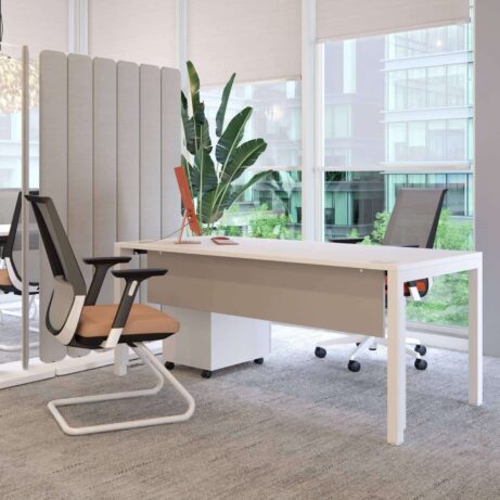 Hive Screens in straight configuration provide flexible privacy in an office setting with a sleek MFC base and metal top rail.
