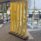 Hive Screens in yellow with six panels, featuring a robust black MFC base, ideal for flexible office privacy.