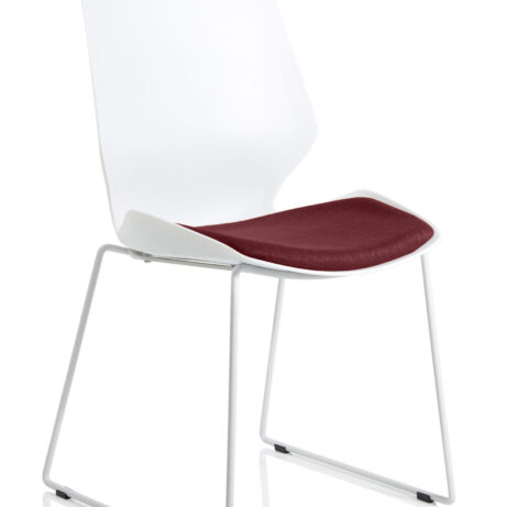 Florence Sled Chair with a white frame and bespoke ginseng chilli fabric seat.
