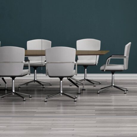 KEY Meet Half Back conference chairs with stackable frames, upholstered in light gray, arranged around a modern table.