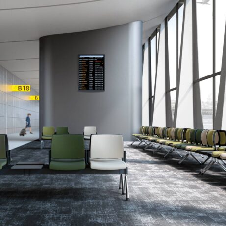 KIND Beam - Faux Leather modular seating in a spacious airport lounge, featuring green and white units arranged for comfort.