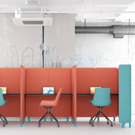 Oasis Screens in orange and teal create private work zones in an open-plan office with desks for two.