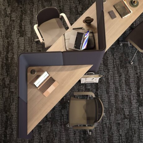 Oasis Floor Standing Screen in dark fabric, creating a private workspace around a shared desk for flexible configurations.