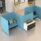 Oasis Screens in blue create private work zones with acoustic panels and flexible configurations for various desk setups.