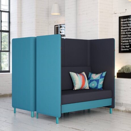 Oasis Screens in blue and dark gray create a private seating area with cushions, ideal for agile workspaces.