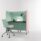 Oasis Screens in green and pink create a modular workspace with acoustic privacy, featuring a desk and rolling chair.