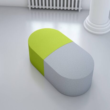 PILL modular seating in green and gray, designed for flexible breakout or reception spaces. Ideal for informal meetings.