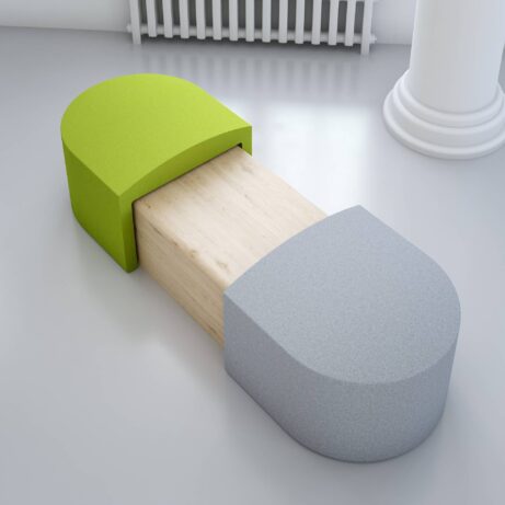 Modular PILL seating in green and gray with concealed table, designed for flexible breakout or reception spaces.