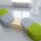 Modular PILL seating in green and gray with integrated wooden table for flexible breakout or reception spaces.