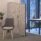 Freestanding curved Floor Standing System Screen in a modern office setting, providing privacy and noise control.