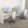 Eden Task Chair in White with ergonomic design, height-adjustable features, and lumbar support in a modern office setting.