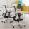 Modular i-sit executive chairs in white and black with chrome bases, designed for flexible office configurations.