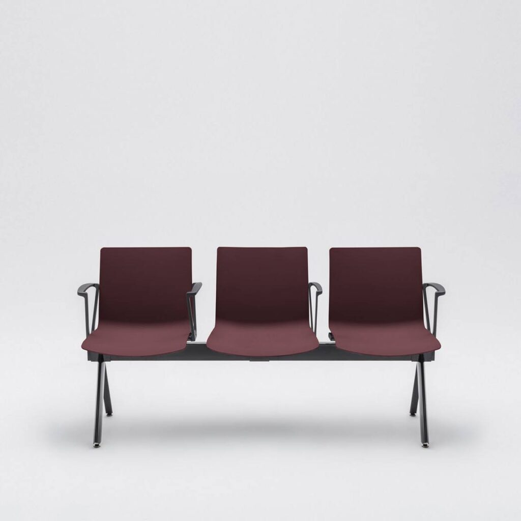 SHILA Beam seating in burgundy with three seats, modular design, featuring armrests and a metal frame.