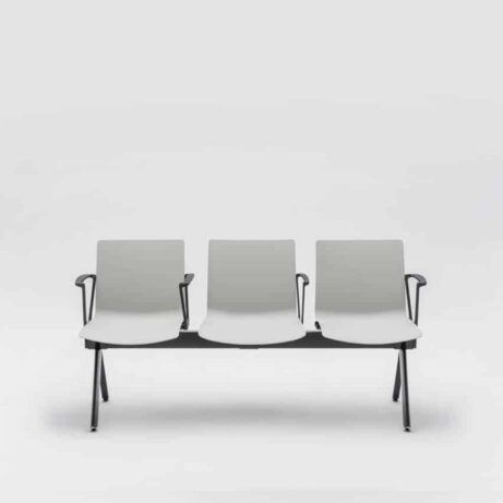 Modular SHILA Beam seating in white with armrests, designed for reception areas and waiting rooms.