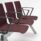SHILA Beam seating in burgundy upholstery with silver armrests, designed for reception and waiting areas. Modular design.