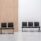 SHILA Beam seating in black, featuring a modular design with two and four-seat benches, suitable for reception areas.