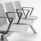 SHILA Beam seating with modular design, grey seats, and black armrests, suitable for reception and waiting areas.