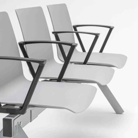 SHILA Beam seating with modular design, grey seats, and black armrests, suitable for reception and waiting areas.